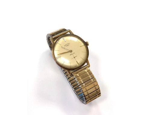 A gent's 9ct gold Rotary wristwatch on plated expanding strap  CONDITION REPORT: Winds and runs. 