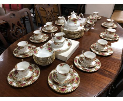 An extensive collection of Royal Albert "Old Country Roses" pattern china comprising a teapot, a sugar bowl, a cream jug, a t