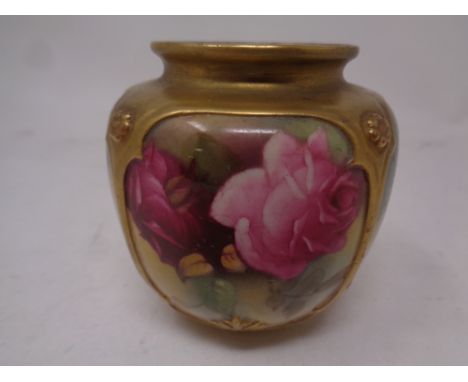 A Royal Worcester hand painted gilded vase decorated with pink roses, height 8.5 cm.