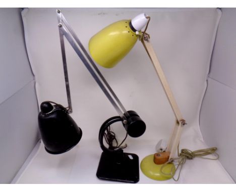 An industrial angle poised lamp together with a further angle poised lamp