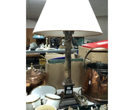 A silver plated Corinthian column table lamp with shade