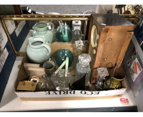 A box containing vintage radio, mantel clock, glass wares, pair of book ends, tankard, gilt rectangular hall mirror, cat orna