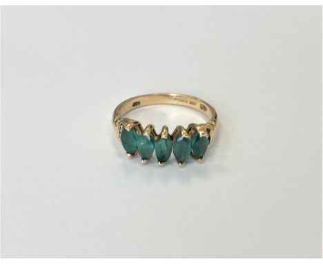 A 14ct gold emerald five stone ring, size M CONDITION REPORT: 2.5g