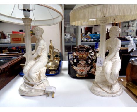 Two 20th century chalk figural table lamps with shades together with a further contemporary figural table lamp with shade, a 