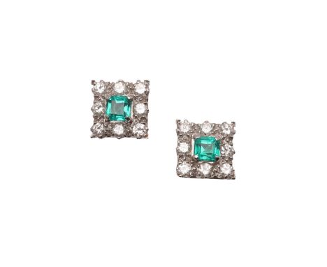 A PAIR OF EMERALD AND DIAMOND CLUSTER STUD EARRINGS. A PAIR OF EMERALD AND DIAMOND CLUSTER STUD EARRINGS. each earring set wi