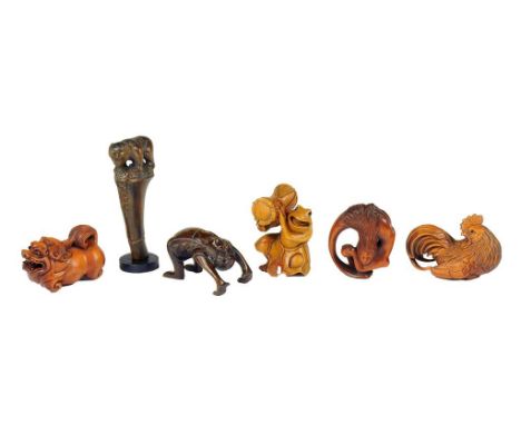FOUR JAPANESE BOXWOOD NETSUKE AND TWO IRONWOOD NETSUKE, 20TH C various sizes, monkey on bamboo 7cm h, variously signed ++ All