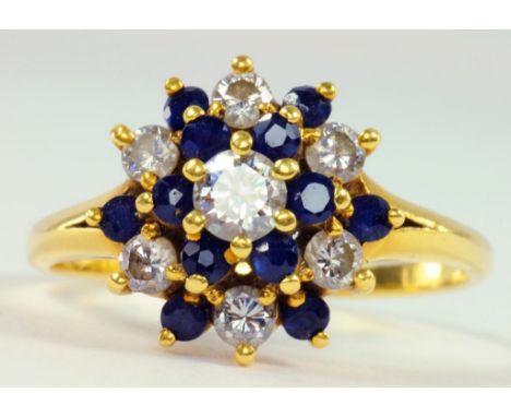 A SAPPHIRE AND DIAMOND CLUSTER RING IN 18CT GOLD, 3.4G GROSS