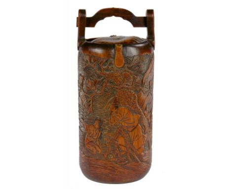 A JAPANESE CARVED BAMBOO FLASK, MEIJI  a scene to the front, the reverse with Tanuki the mythical badger contemplating the fu