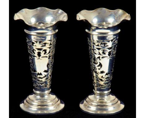 A PAIR OF EDWARD VII PIERCED SILVER TRUMPET SHAPED VASES, SHEFFIELD 1907, LOADED