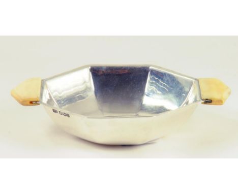 AN EDWARD VII SILVER OCTAGONAL NUT DISH WITH IVORY HANDLES, SHEFFIELD 1936, 1OZ 10DWTS GROSS