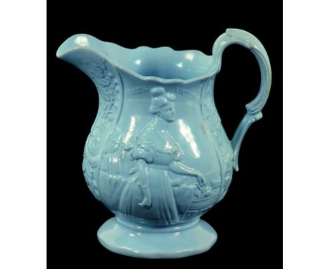 A STAFFORDSHIRE PRESS MOULDED BLUE EARTHENWARE COMMEMORATIVE JUG, WITH THREE QUARTER LENGTH PORTRAIT OF QUEEN VICTORIA