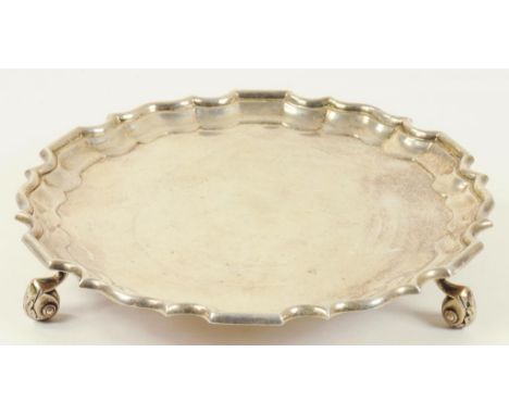 A GEORGE V SILVER WAITER, ON THREE FEET, SHEFFIELD 1938, 5OZS