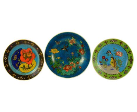 THREE JAPANESE CLOISONNÉ ENAMEL ON PORCELAIN DISHES, MEIJI  18-20.5cm diam ++ Quail plate cracked, the others in good conditi