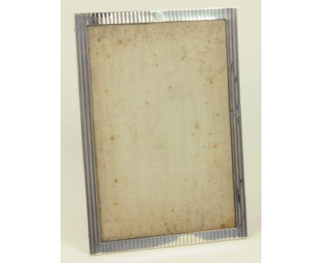 A GEORGE V SILVER PHOTOGRAPH FRAME, ENGINE TURNED, LONDON 1920