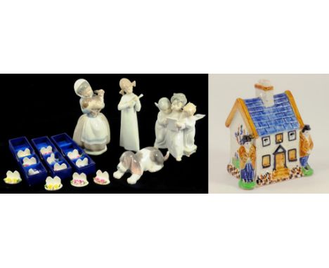 A LLADRO DOG, THREE OTHER SIMILAR FIGURES, THREE SETS OF FOUR AYNSLEY PLACE STANDS AND A YORKSHIRE TYPE EARTHENWARE COTTAGE B