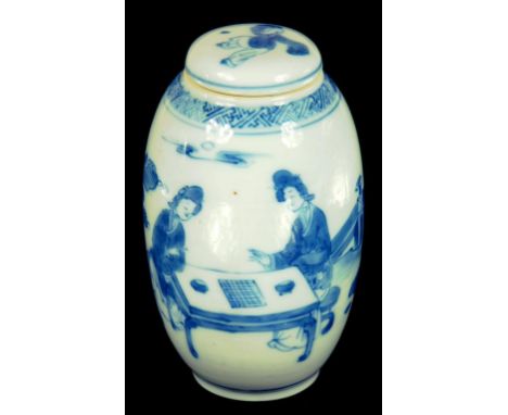 A CHINESE BLUE AND WHITE OVIFORM JAR AND COVER, KANGXI  painted with two ladies at a table playing a game whilst observed by 