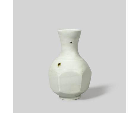 Bernard LeachSmall vase, circa 1963Porcelain, celadon glaze with speckles, the body with broad cutsided facets.15 cm highUnde