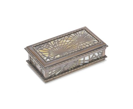 Tiffany StudiosStamp box, model no. 801, circa 1900 Copper, onyx.3 x 10.4 x 6 cmProduced by Tiffany Studios, New York, United