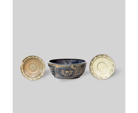 Bernard Leach and Leach PotteryBowl and two saucersStoneware with wax-resist design. Stoneware, pale grey-green ash glaze wit