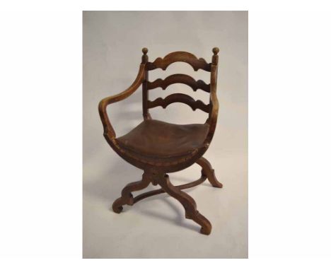 Early 20th century X-frame oak armchair with ladder back  