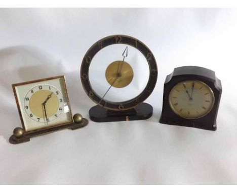 Small Bakelite Smith's electric mantel clock together with a further retro teak and brass framed mantel clock with glass cent