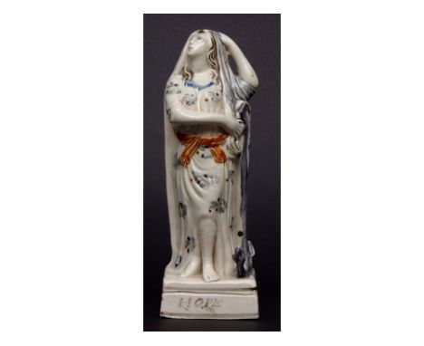 Prattware figure of Hope, circa 1790, with title to front of square base, modelled as a lady with a large anchor by her side,