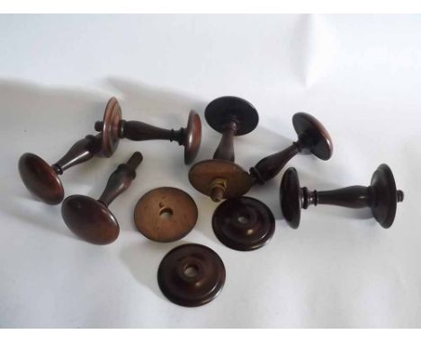 Group of six 19th century mahogany turned mushroom formed coat hooks, each measuring 12cms 