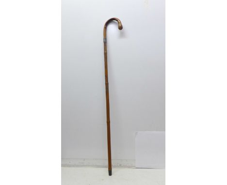 A 19th Century bamboo sword stick with oriental carved decoration and triangular blade, length 72.5cm, overall length of stic