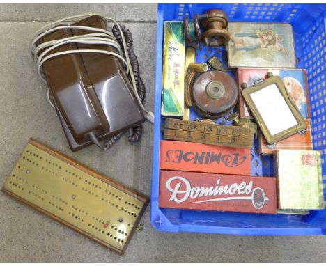 Assorted items including fishing reels, cribbage board, 1970's 'trim' phone, harmonica, etc. 