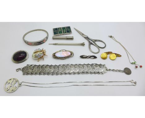 A blister pearl brooch, a coin bracelet, a hallmarked silver pendant and chain, an enamelled buckle, a hallmarked silver broo
