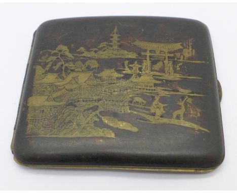A Japanese cigarette case depicting a lake scene with Torii gate, signed 