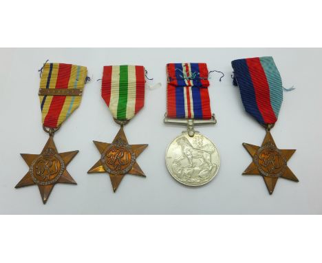 Four WWII medals including The Africa Star with 8th Army clasp 