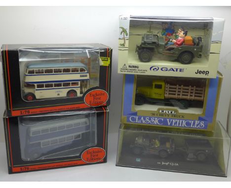 Model vehicles; an Ertl model Chevy Truck, two EFE buses , a Jeep and a Gate Laurel &amp; Hardy in Jeep, all boxed 