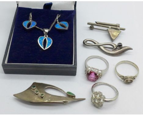 A silver and synthetic opal necklet and earrings set, three silver brooches and three silver gem set rings 