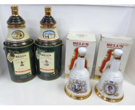 Four Bell's Scotch Whisky bottles with contents, two commemorative and two Extra Special 