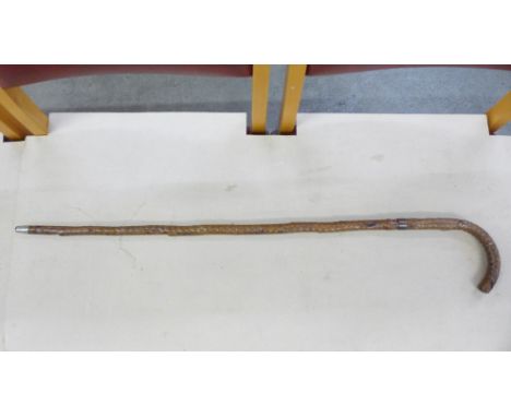 A Victorian walking cane/sword stick, the blade marked Toledo, blade length 60.5cm, overall length of cane 86.5cm