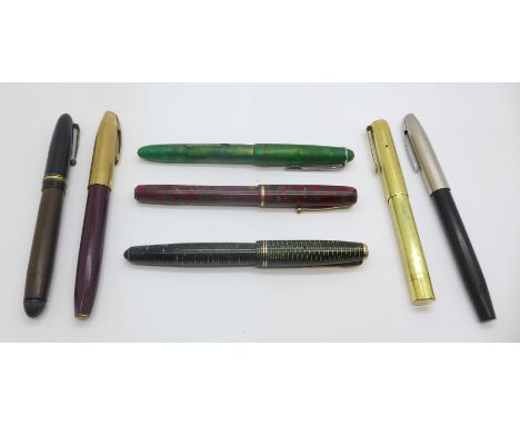 An Olo gold plated fountain pen with 14ct gold nib, two Sheaffer fountain pens, one with 14ct gold nib, (pump action), Waterm