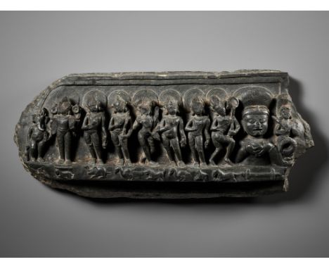 A BASALT RELIEF DEPICTING GANESHA AND THE NINE PLANETS (NAVAGRAHA), 10TH-11TH CENTURYNorthern India, c. 950-1000 AD. Finely c