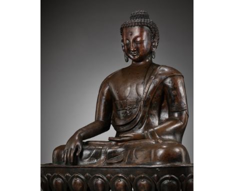 A LARGE CAST AND REPOUSSE COPPER FIGURE OF BUDDHA SHAKYAMUNI, QING DYNASTY 清代大型錘鍱釋迦牟尼銅像China, late 18th to early 19th century