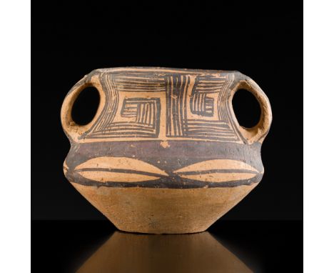 A PAINTED POTTERY JAR, NEOLITHIC PERIODChina, Majiayao culture, 3rd-2nd millennium BC. The compressed body surmounted by a wa