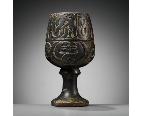 A LARGE AND HEAVY 'SNAKE AND LION' CHLORITE STEMCUP, JIROFT CULTURE, 3RD MILLENNIUM BCSoutheastern Iran, c. 2800-2300 BC. Wel