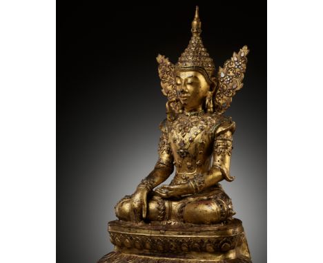 A GILT-LACQUERED WOOD FIGURE OF BUDDHA SHAKYAMUNI, SHAN STATE, BURMA, LATE 18TH TO EARLY 19TH CENTURYFinely carved, seated in