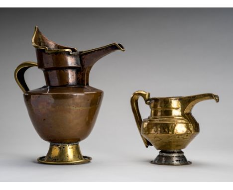 A PARCEL-GILT COPPER 'MONK'S CAP' EWER AND A BRASS EWER, 19th CENTURYTibet, 19th century. The first of tapering form surmount