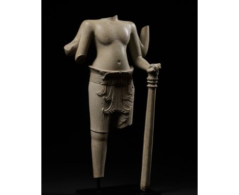 A KHMER SANDSTONE TORSO OF VISHNU, BAKHENG STYLE, ANGKOR PERIODKhmer Empire, 9th-10th century. The four-armed deity powerfull