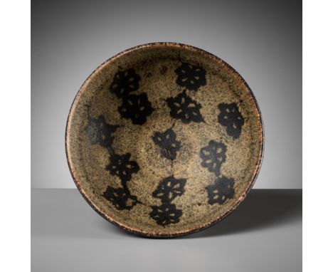 A JIZHOU PAPERCUT RESIST-DECORATED 'PRUNUS' BOWL, SOUTHERN SONG DYNASTY 南宋吉州貼花碗China, 1127-1279. The rounded conical body det