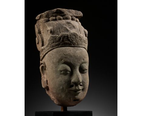 A SANDSTONE HEAD OF AN OFFICIAL, MING DYNASTYChina, 13th to 15th century. Finely carved wearing an official's cap detailed wi