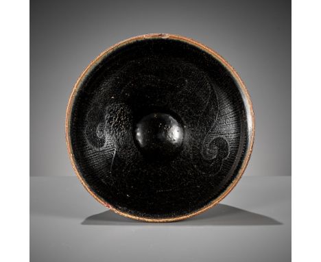 A CIZHOU SILVER-DECORATED AND BLACK-GLAZED TEA BOWL, SOUTHERN SONG OR JIN DYNASTY 南宋或金代磁州窯China, 12th-13th century. The deep 