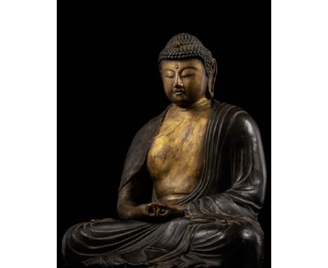 A GILT-LACQUERED WOOD FIGURE OF AMIDA NYORAIJapan, 19th century. Seated in dhyanasana, the hands lowered in mido no join, dre
