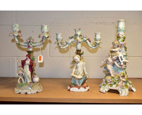 THREE LATE 19TH CENTURY CONTINENTAL PORCELAIN CANDELABRUM IN NEED OF RESTORATION, comprising a Sitzendorf floral encrusted ba