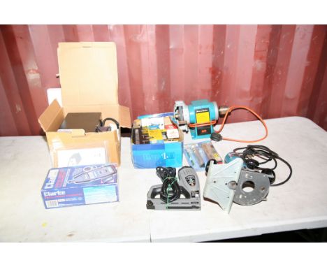 A BOSCH POF 50 ROUTER, a Duratool heat gun, a Black and Decker Bench Grinder, a Stanley electric Stapler, a tray of staples a